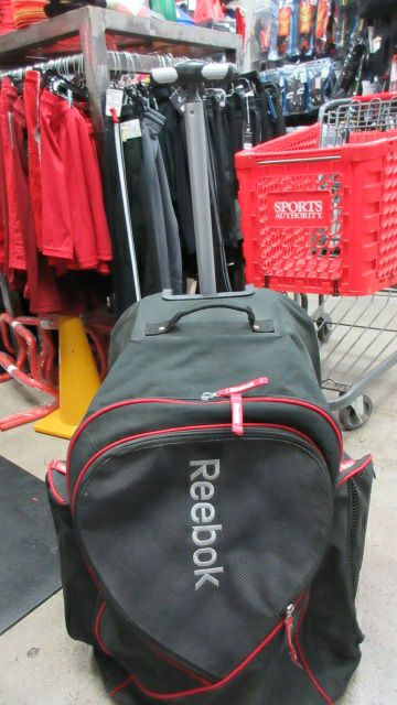 Load image into Gallery viewer, Used Reebok 10K Backpack Wheel Hockey Bag - has wear
