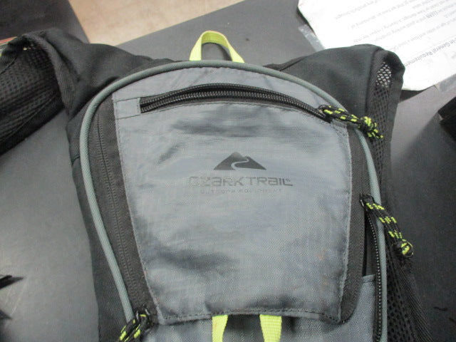 Load image into Gallery viewer, Used Ozark Trail Hydration Pack W/ Bladder - Needs Mouthpiece
