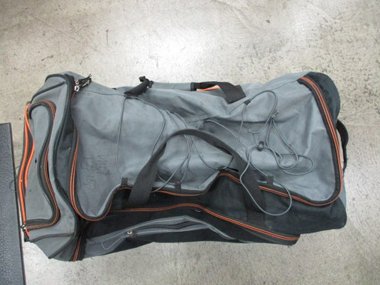 Used Coleman Wheeled Duffle Bag - Holes