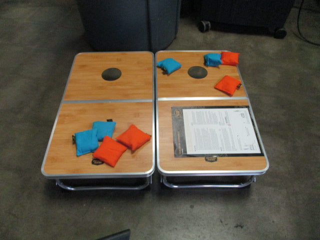 Load image into Gallery viewer, Used Outside Inside Compact Convertible Dual Purpose Tables &amp; Cornhole Set
