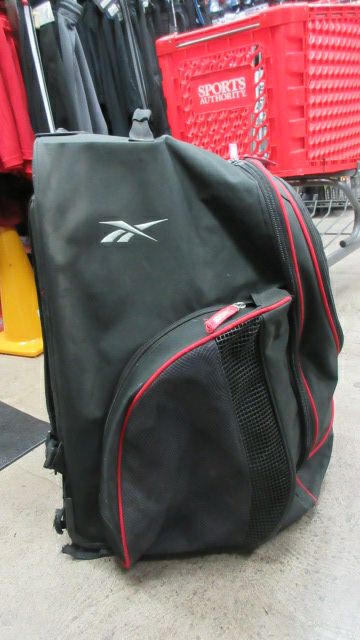 Load image into Gallery viewer, Used Reebok 10K Backpack Wheel Hockey Bag - has wear
