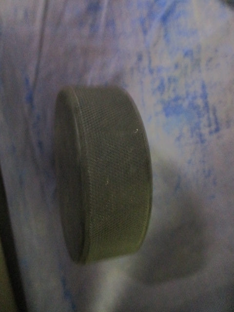 Used Black Ice Hockey PUCK