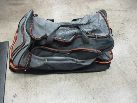 Used Coleman Wheeled Duffle Bag - Holes