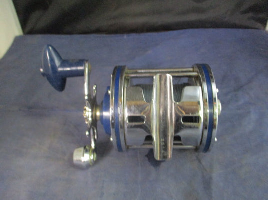 Used Olympic Dolphin 614 Fishing Reel w/ Line