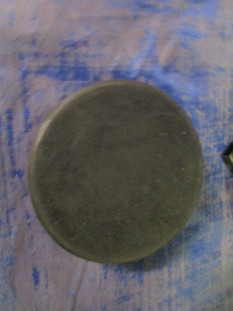 Used Black Ice Hockey PUCK