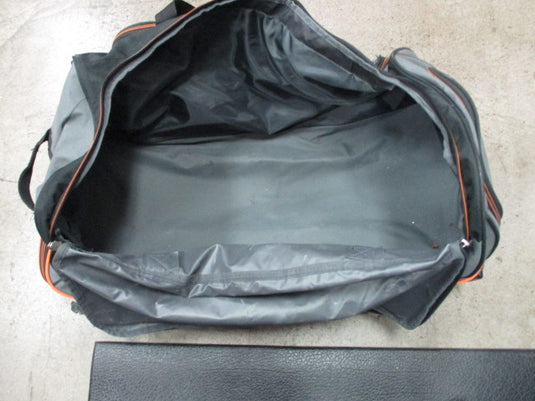 Used Coleman Wheeled Duffle Bag - Holes