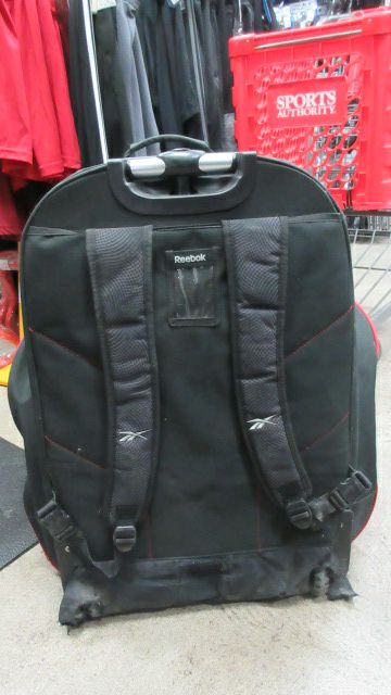 Load image into Gallery viewer, Used Reebok 10K Backpack Wheel Hockey Bag - has wear
