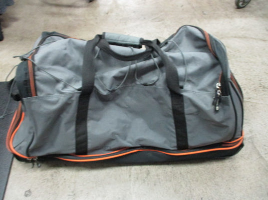 Used Coleman Wheeled Duffle Bag - Holes